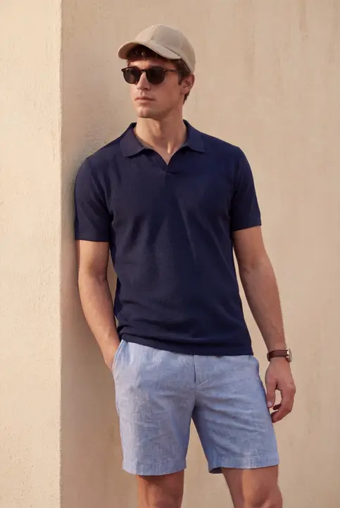 Navy polo, chambray shorts
